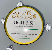 Load image into Gallery viewer, Rich Bish luxury coconut soy 8oz candle in marble metal tin with lid. Candle features fragrance notes of amber, cocoa butter, and jasmine. Best seller
