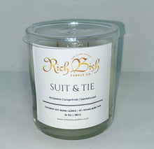 Load image into Gallery viewer, Rich Bish Candle Co's "Suit and Tie" 10oz coconut soy wax blend candle in reusable glass vessel with plastic lid. Top fragrance notes are bergamot, grapefruit, and sandalwood.  Best seller