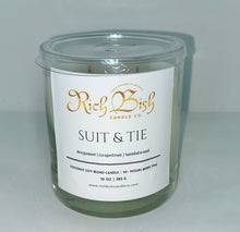Load image into Gallery viewer, Rich Bish Candle Co&#39;s &quot;Suit and Tie&quot; 10oz coconut soy wax blend candle in reusable glass vessel with plastic lid. Top fragrance notes are bergamot, grapefruit, and sandalwood.  Best seller 
