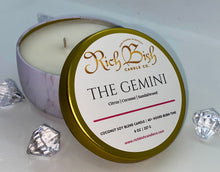 Load image into Gallery viewer, Rich Bish Candle Co&#39;s &quot;The Gemini&quot; 8oz luxury coconut soy wax blend hand poured candle in gorgeous marble metal tin with lid. Top fragrance notes are citrus, coconut, and sandalwood. 
